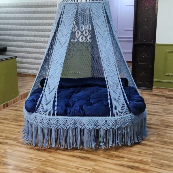 Blue macrame swing bed